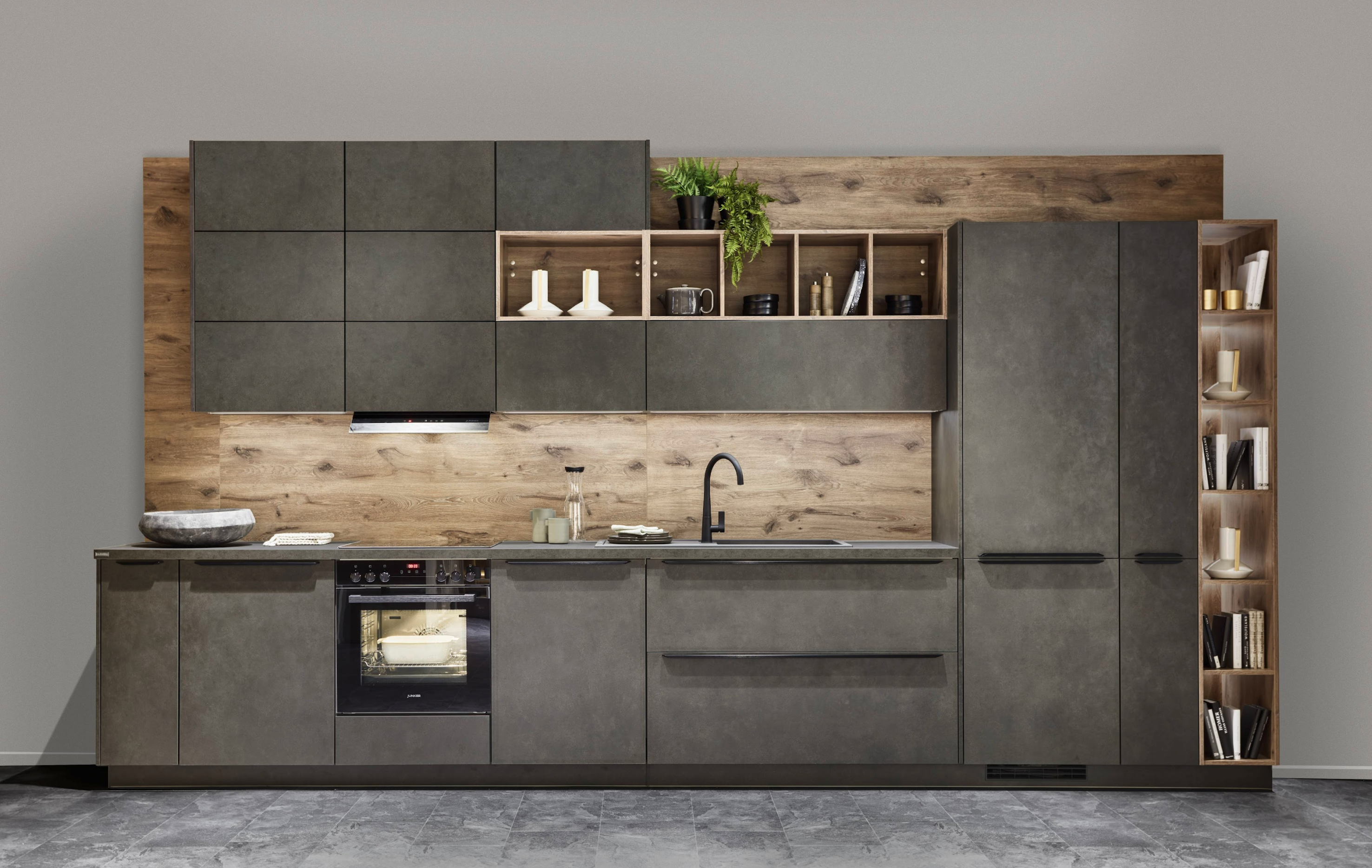 Modern German kitchen interior featuring sleek cabinetry and high-end appliances.